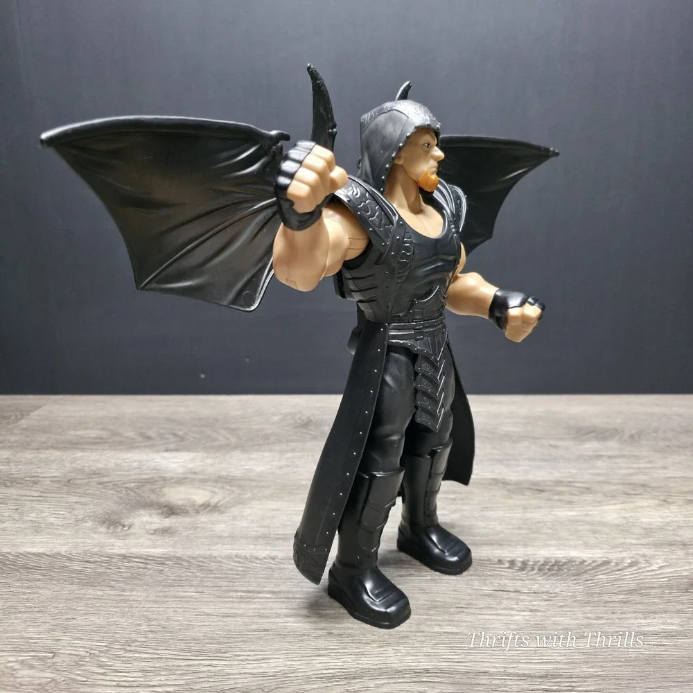2014 Mattel WWE The Undertaker with Pop Up Black Wings 12